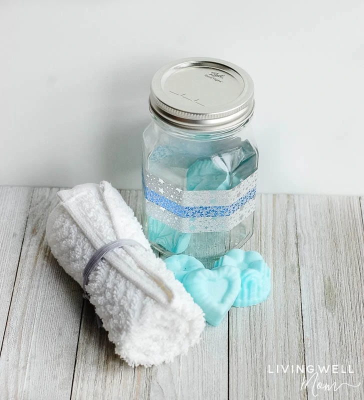 DIY peppermint &lemon essential oil shower melts in a glass container 