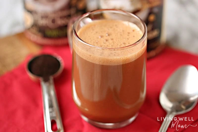 foaming homemade mocha latte with cocoa