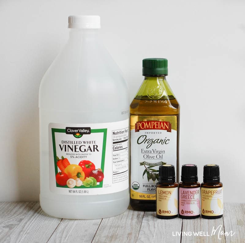 Vinegar, lemon essential oil, olive oil ingredients for dusting spray