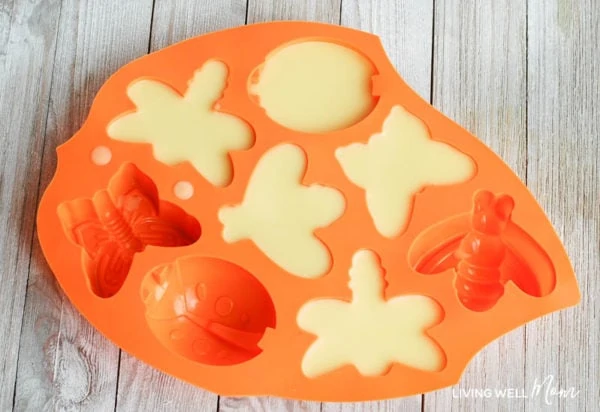 natural bug repellent melted and poured into a bug shaped silicone mold and cooled