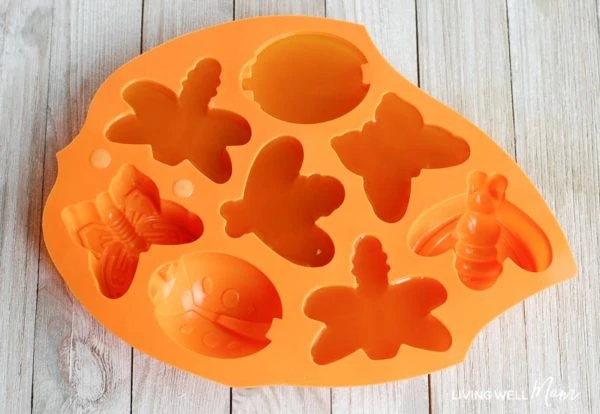 natural bug repellent melted and poured into a bug shaped silicone mold
