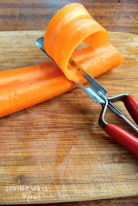 peeling a carrot for carrot pasta