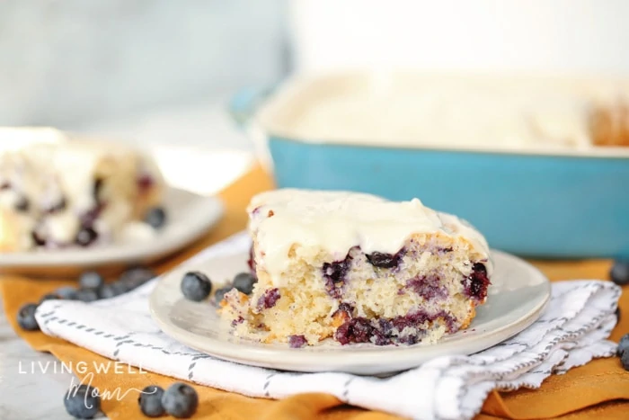 A piece of blueberry dump cake filled with fresh blueberries. 