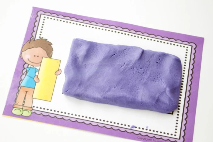 close up of rectangle playdough shape mat purple playdough