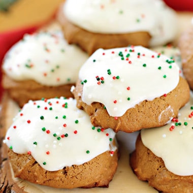 gluten-free frosted ginger cookies stacked on top of each other