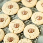 gluten-free peanut butter blossom cookies on a wire rack