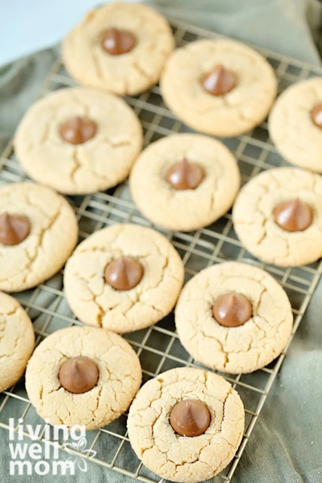 gluten-free peanut butter blossom cookies on a wire rack
