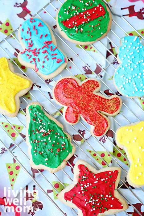 Christmas themed gluten-free sugar cookies on a wire rack