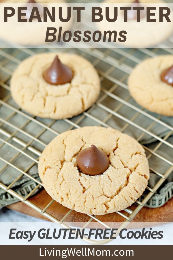 gluten-free peanut butter blossoms with hershey's kisses cooling on wire rack