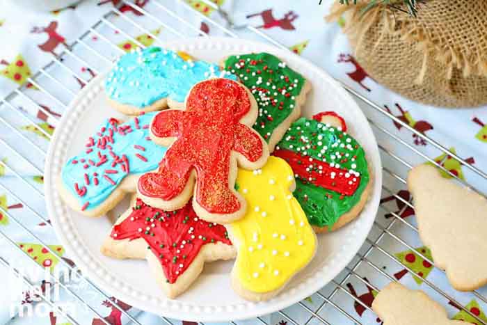 iced gluten free sugar cookies on a plate