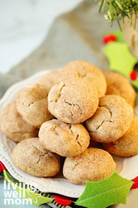Christmas cookies coated in a cinnamon sugar mixture
