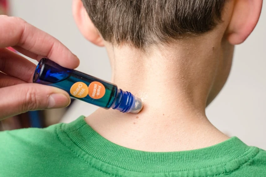 essential oil roller for child back of neck
