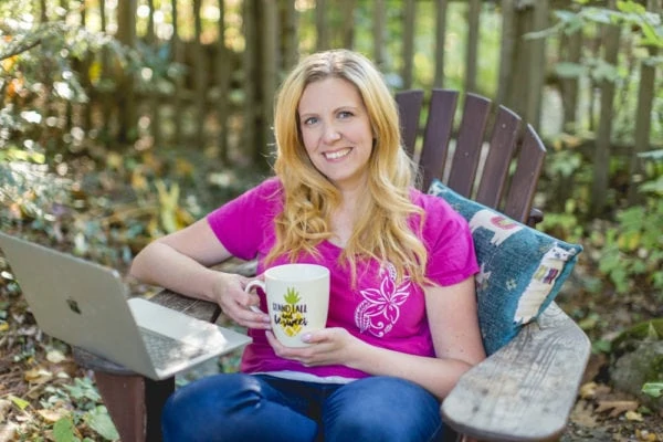 Erika Bragdon sitting on a chair doing some work