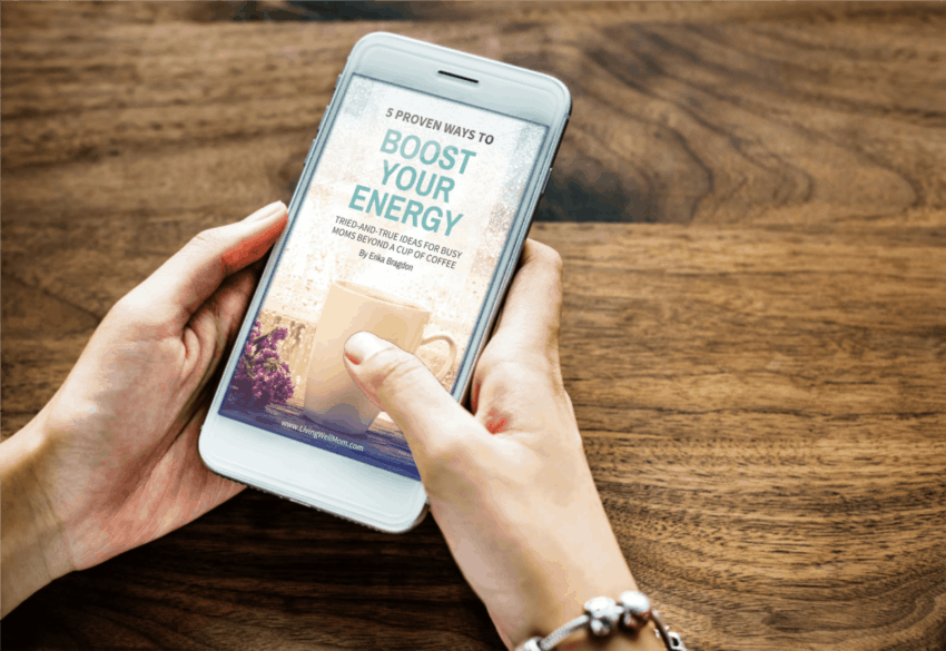 woman holding phone feature boost your energy book