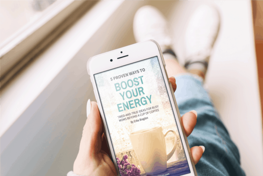 woman holding phone feature boost your energy book