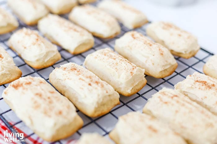 frosted cookie logs sprinkled with nutmeg