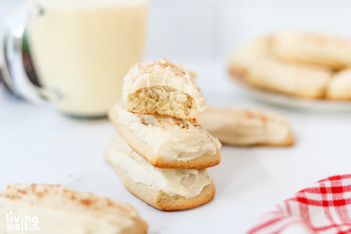 stack of Christmas treats with holiday drink blurred in the background