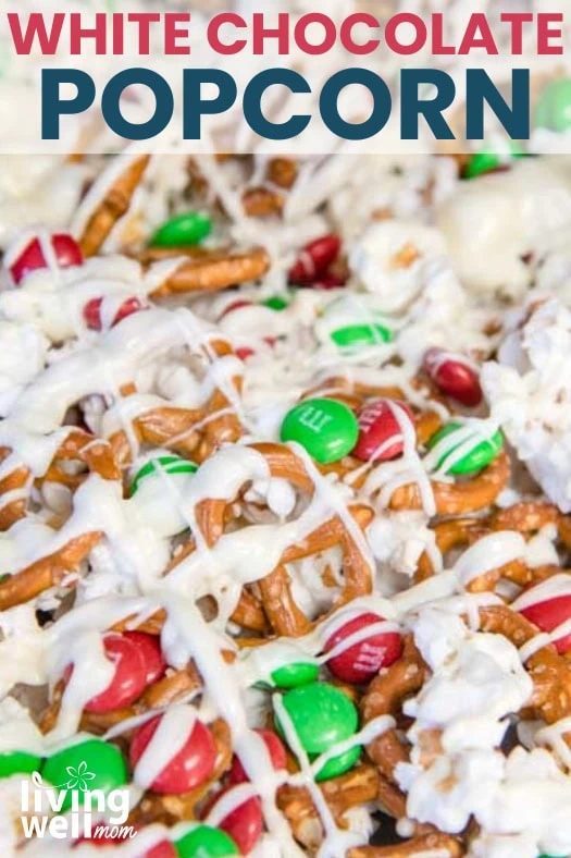 close up of white chocolate popcorn with pretzels and m&ms