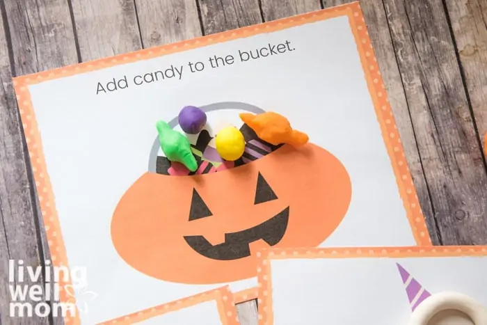 Playdough pieces filling a candy bucket halloween printable mat