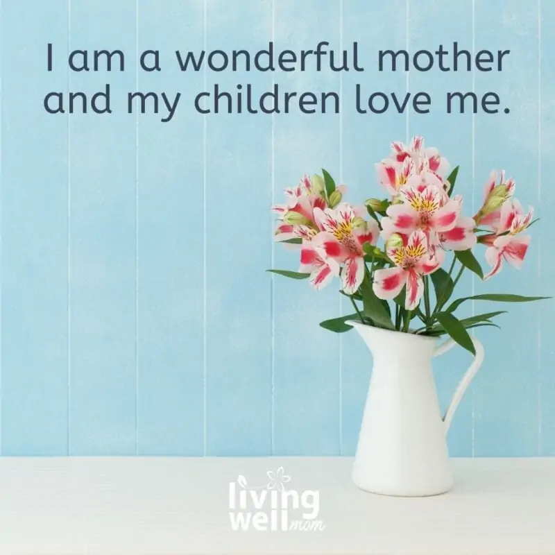 A positive affirmation card on blue background prompting moms to say, "I am a wonderful mother and my children love me."