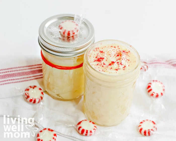 jars of DIY lotion surrounded by peppermint candy