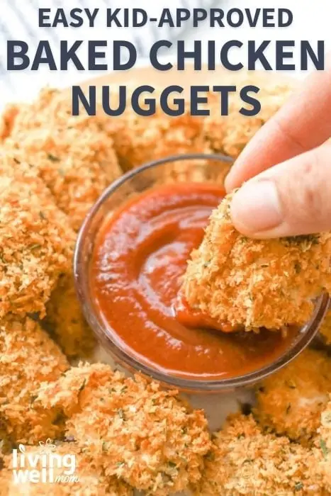dipping baked chicken nuggets into red sauce