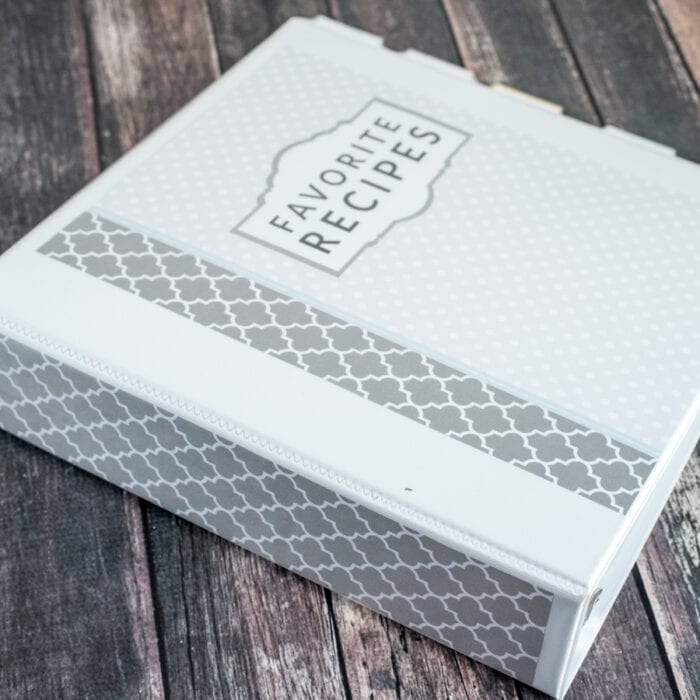 pretty recipe binder in gray and white on wood background