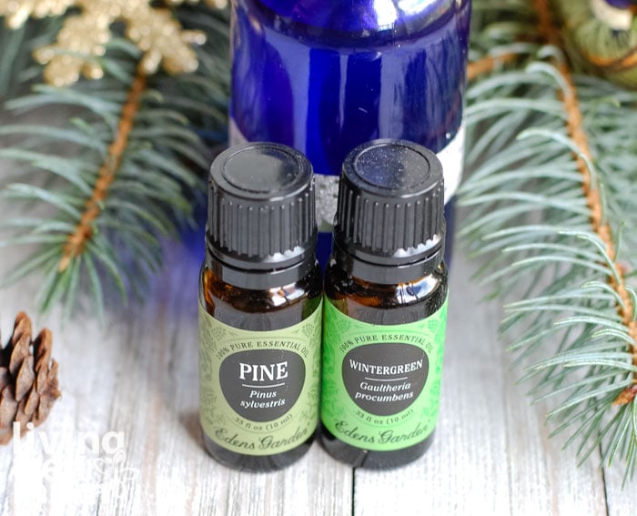 pine and wintergreen essential oils in small bottles
