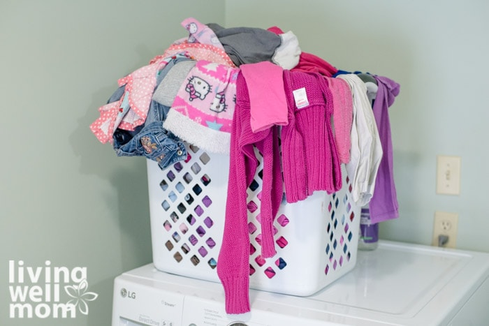 kids clothes in a hamper