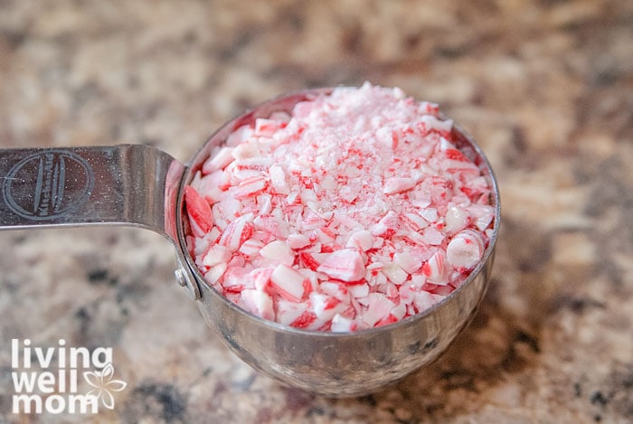 measuring cup with crushed candy cane bits