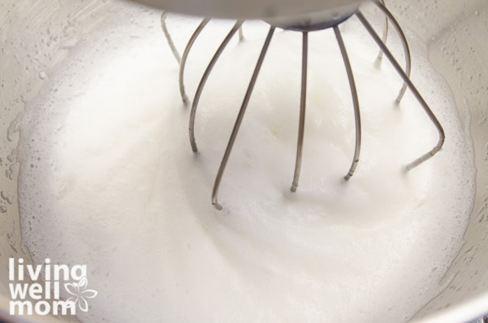sugar and egg whites in mixer bowl