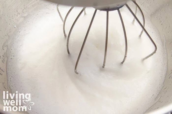 sugar and egg whites in mixer bowl