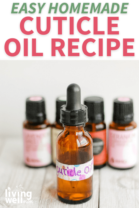 Homemade cuticle oil with essential oils in the background