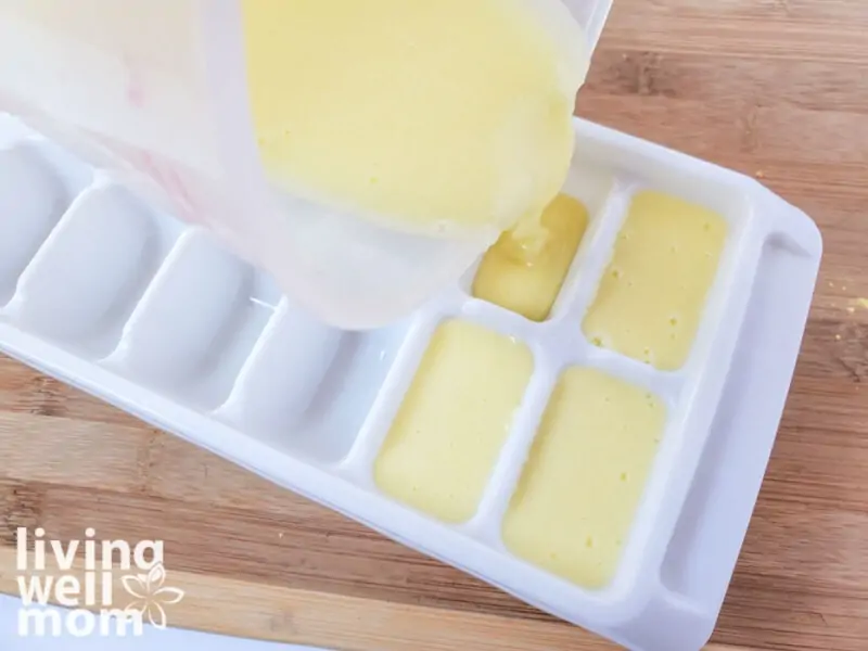 pouring body scrub mixture into silicone mold