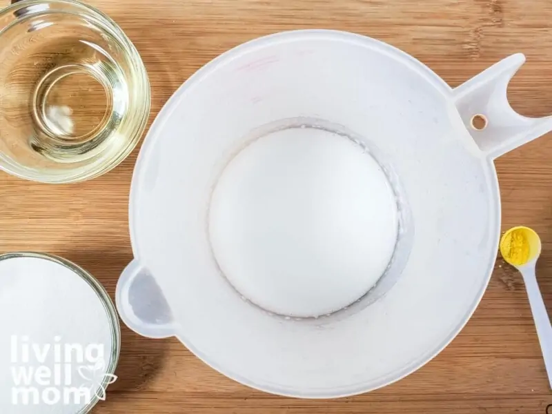 melted soap cubes in a measuring cup