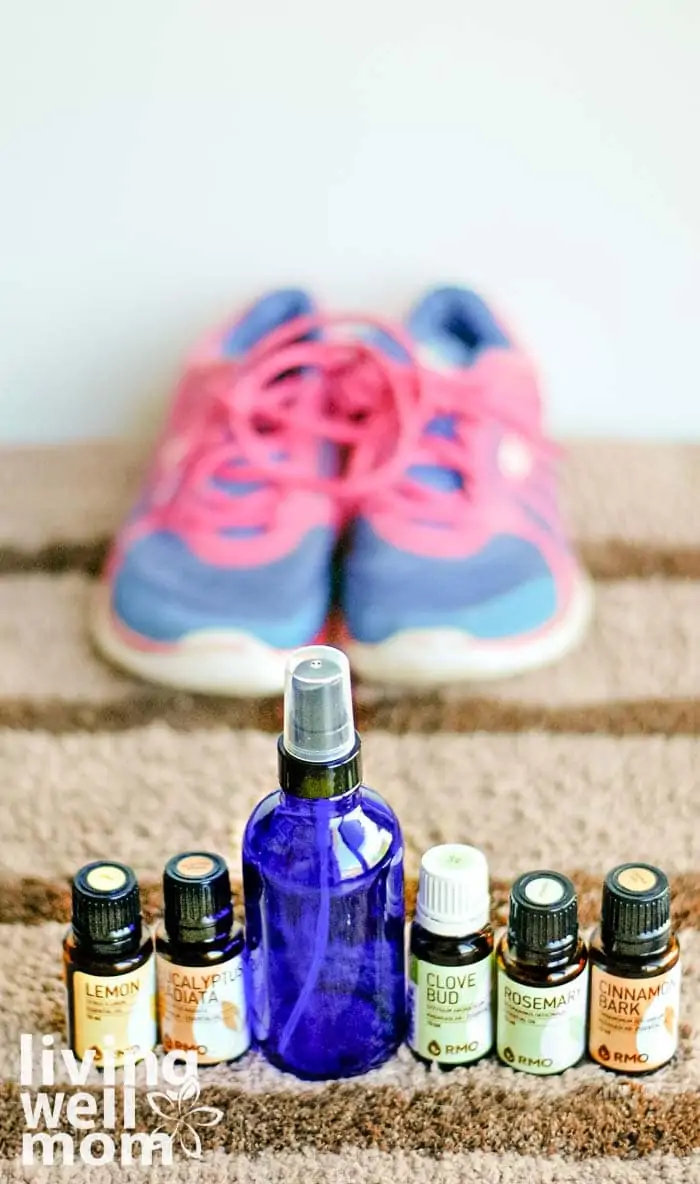 a spray bottle with essential oil stinky shoes remedy 