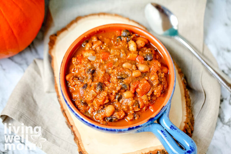small bowl of pumpkin chili with beans and ground beef 