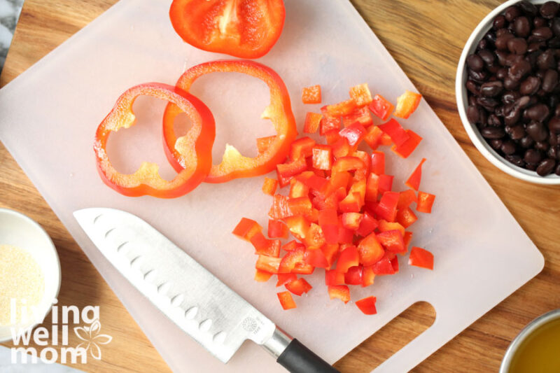 diced red bell pepper on a cutting board