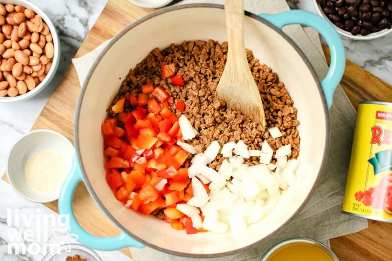 pot of peppers, ground beef, onions and spices