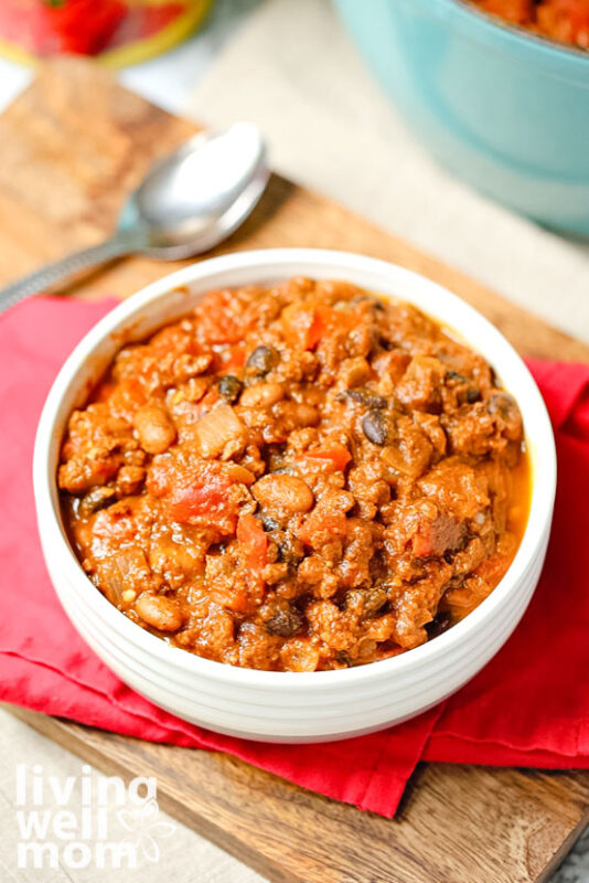 white bowl of pumpkin chili made with red gold tomatoes