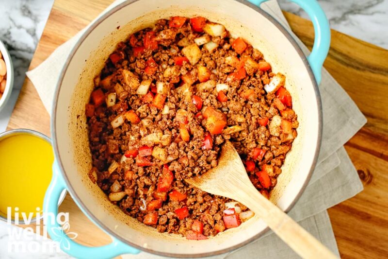 dutch oven with seasoned ground turkey and veggies