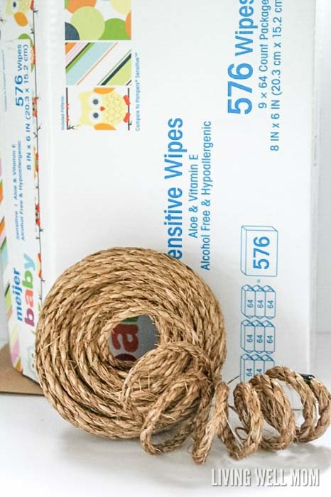 a roll of twine rope and a cardboard box