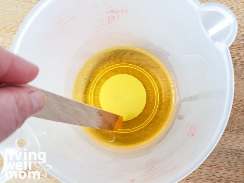 all natural oil in a measuring cup