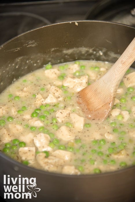 stirring pot of ingredients for chicken and dumpling casserole