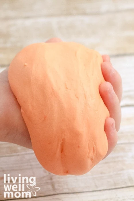 holding a ball of homemade putty