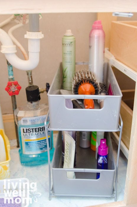 using vertical space under bathroom vanity for organization hacks