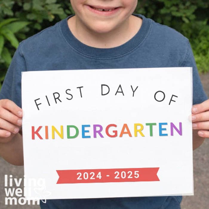 first day of kindergarten sign with rainbow letters