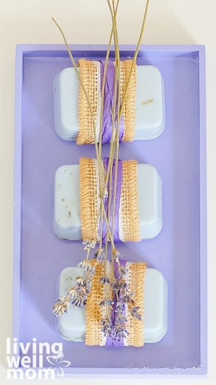 wrapped lavender soap on a tray 