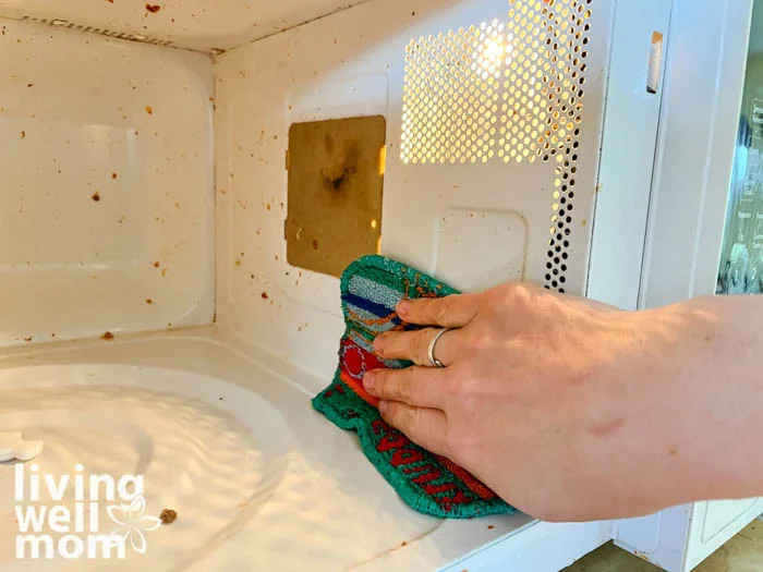cleaning inside of microwave