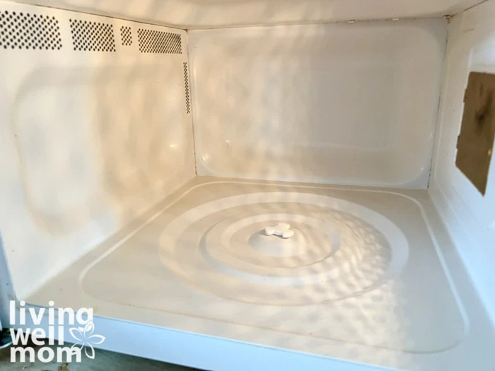 interior of microwave oven cleaned with vinegar and lemon juice